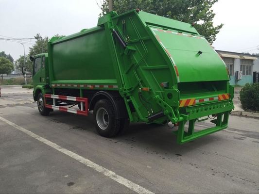 SINOTRUK HOWO 4*2 preßte Verdichtungsgerät-LKW des Abfall-12m3 zusammen