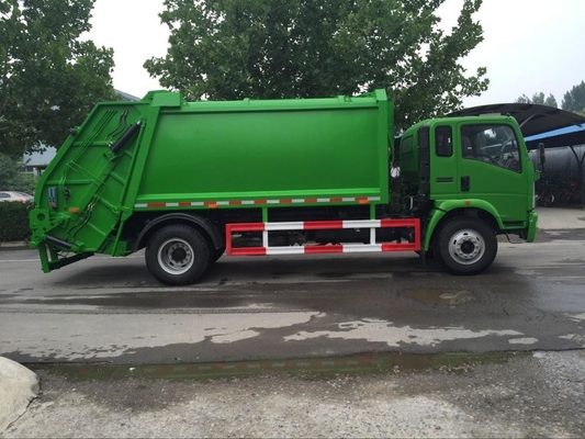 SINOTRUK HOWO 4*2 preßte Verdichtungsgerät-LKW des Abfall-12m3 zusammen